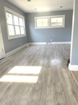 empty room featuring hardwood / wood-style flooring