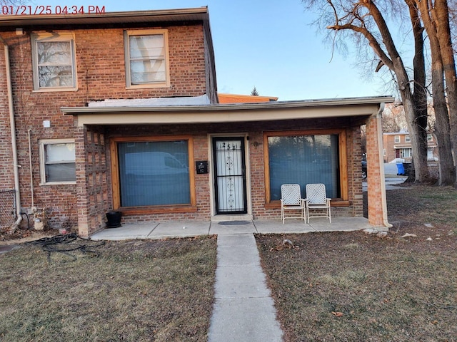 view of front of home with a patio area