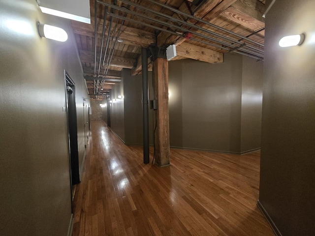 hall with dark hardwood / wood-style floors