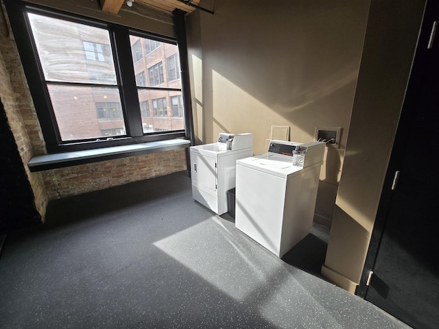 laundry area with washer and clothes dryer