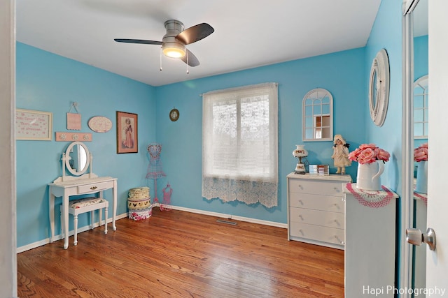 interior space featuring hardwood / wood-style flooring and ceiling fan