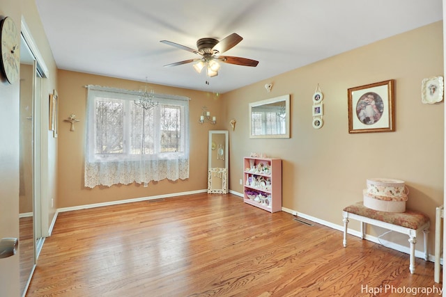 miscellaneous room featuring ceiling fan and light wood-type flooring