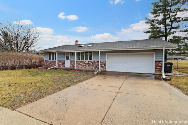 ranch-style house with a garage and a front yard