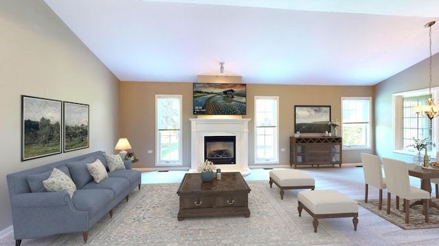 carpeted living room featuring lofted ceiling and an inviting chandelier