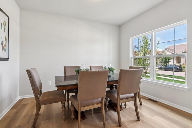 607 Virginia St, Elburn, IL 60119 - dining area with light wood-style floors and healthy amount of natural light