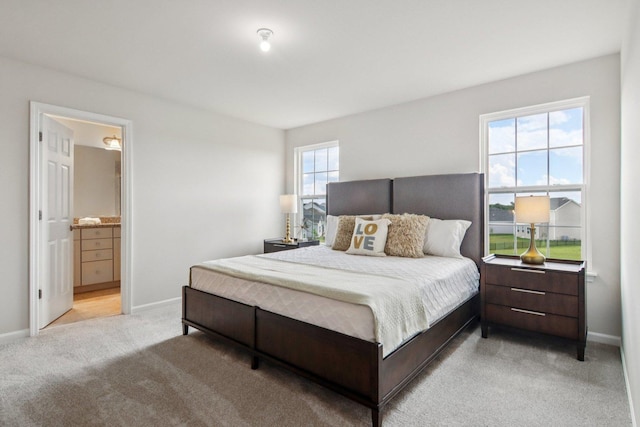 607 Virginia St, Elburn, IL 60119 - bedroom with light carpet and connected bathroom