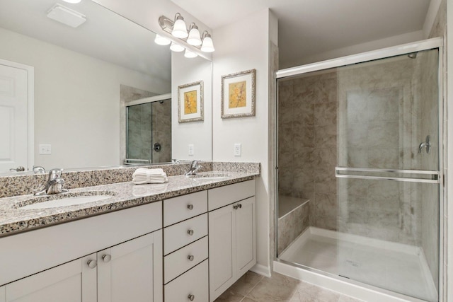 607 Virginia St, Elburn, IL 60119 - bathroom featuring double vanity, a shower stall, and tile patterned flooring