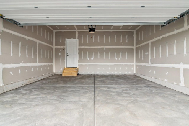 607 Virginia St, Elburn, IL 60119 - garage featuring a garage door opener