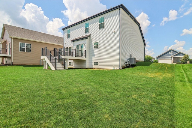 607 Virginia St, Elburn, IL 60119 - back of house with stairs, a deck, and a lawn
