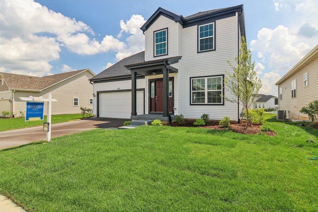 607 Virginia St, Elburn, IL 60119 - traditional home with driveway, a front lawn, an attached garage, and a shingled roof