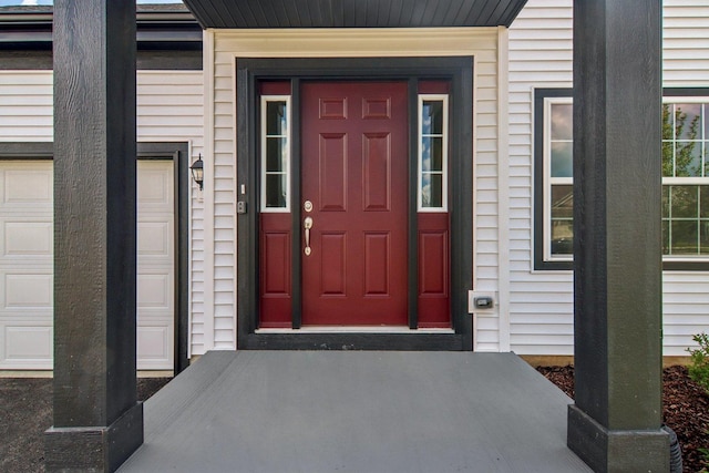 607 Virginia St, Elburn, IL 60119 - property entrance featuring a garage