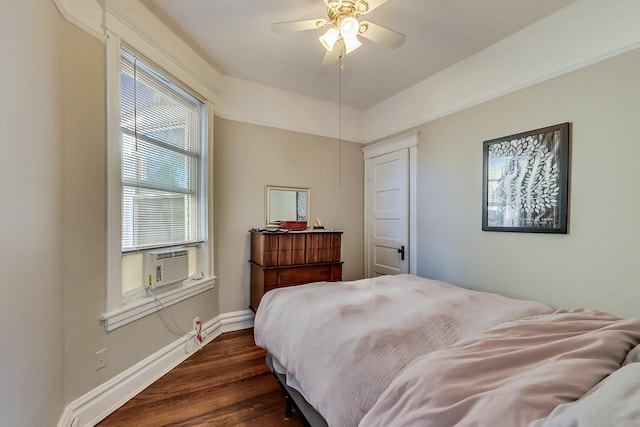 bedroom with dark wood-type flooring and ceiling fan