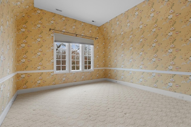 spare room featuring carpet flooring