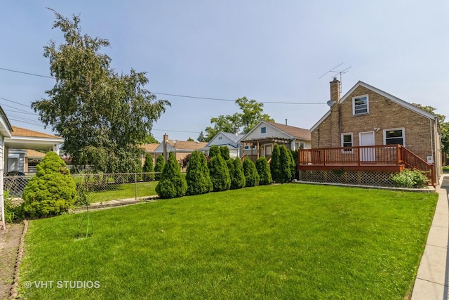 view of yard with a deck