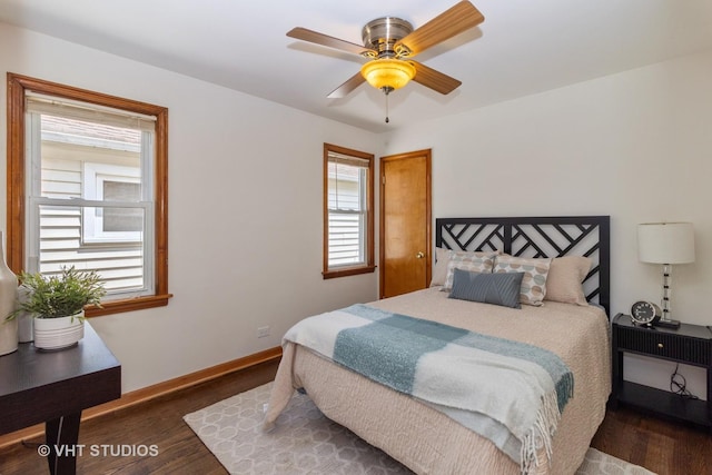 bedroom featuring dark wood-type flooring and ceiling fan