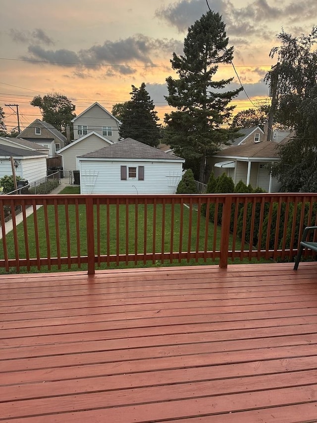 deck at dusk with a yard