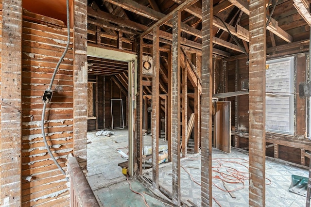 miscellaneous room featuring lofted ceiling