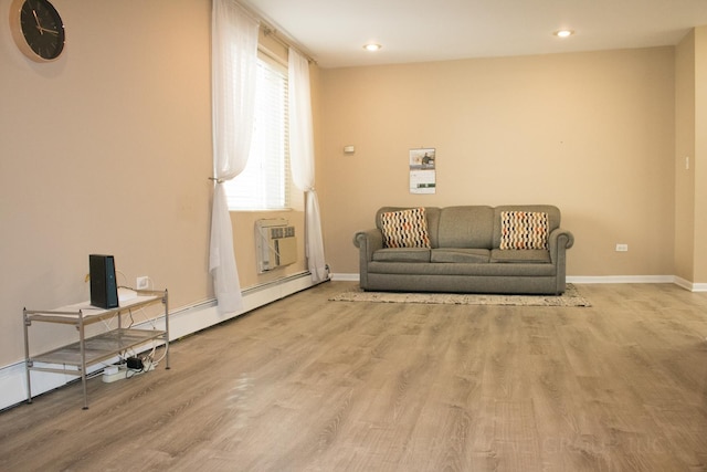 sitting room featuring light wood-type flooring