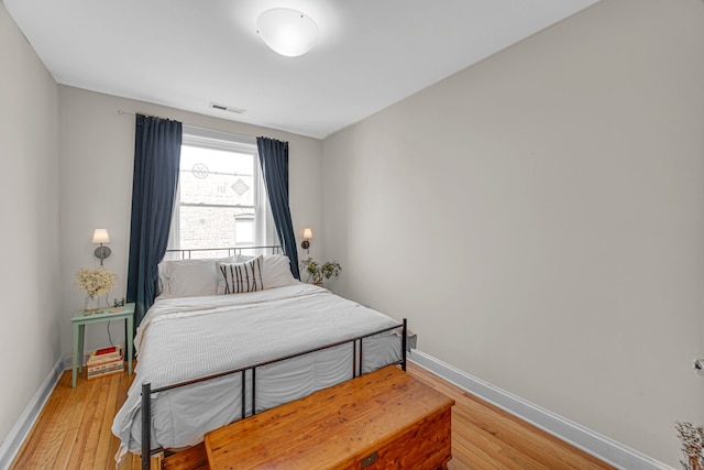 bedroom featuring hardwood / wood-style flooring