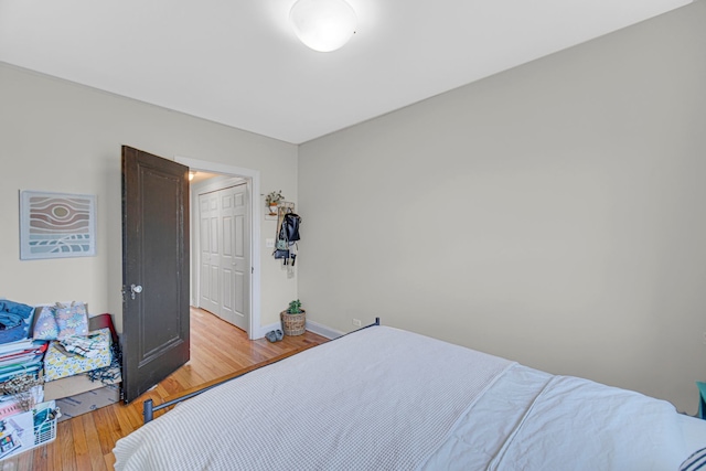 bedroom featuring light wood-type flooring