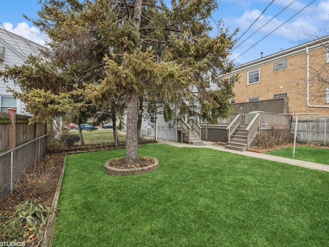 view of yard with a deck