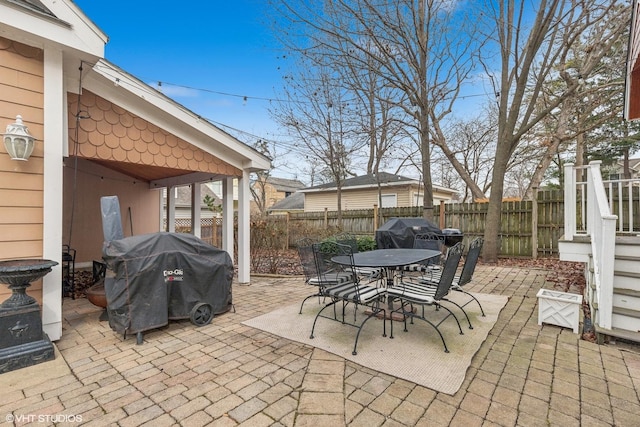 view of patio / terrace with a grill