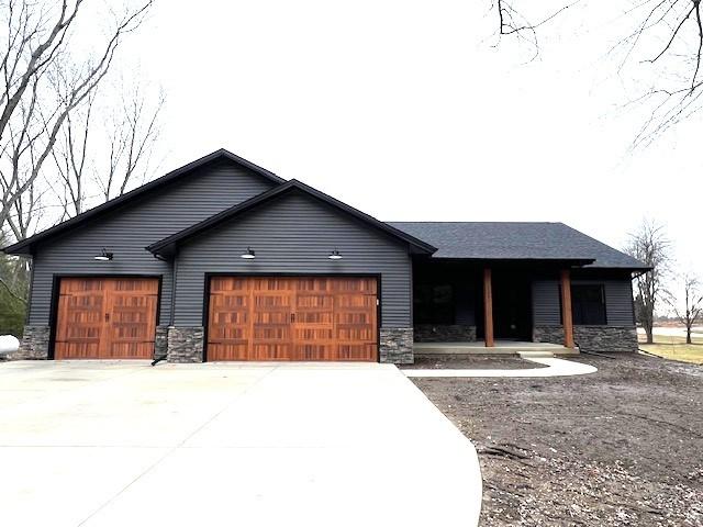 view of front of home with a garage