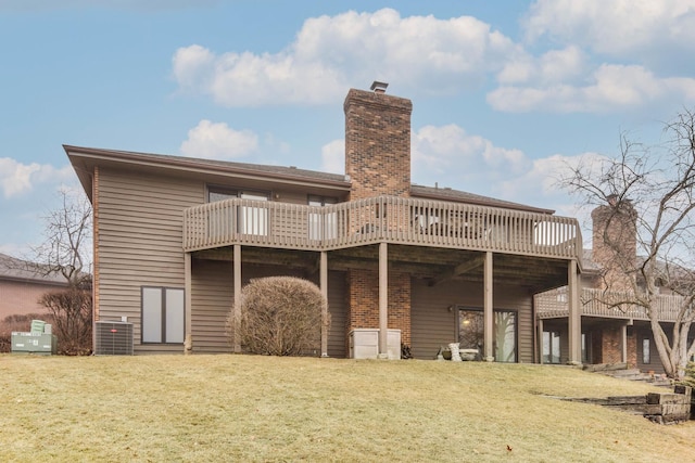 back of property featuring central AC unit, a deck, and a lawn