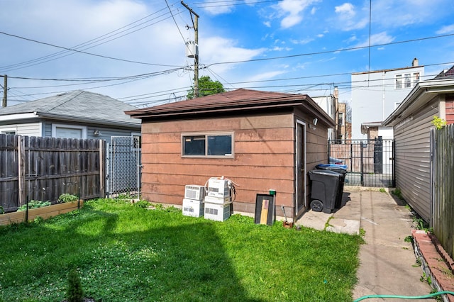 view of outdoor structure with a yard