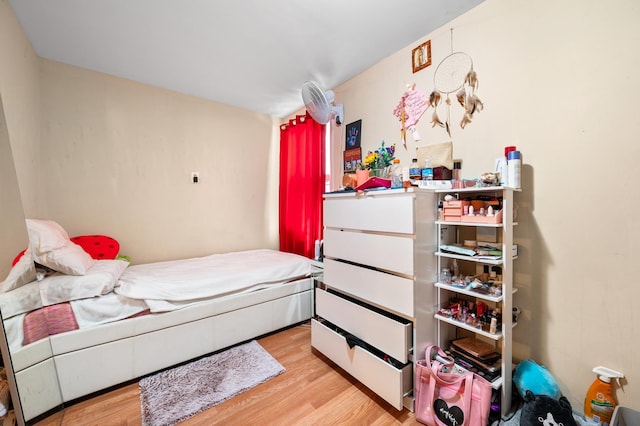 bedroom with light wood-type flooring