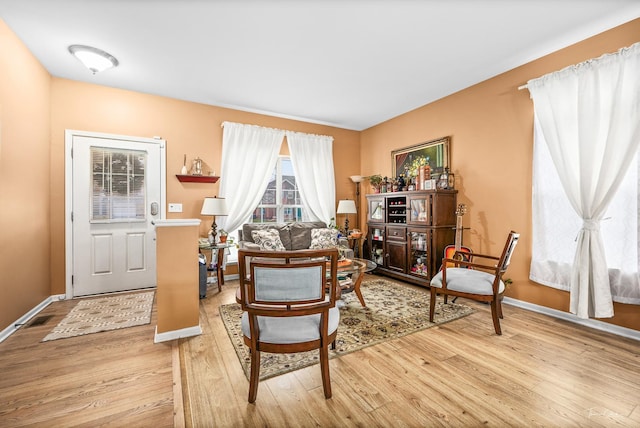 sitting room with light hardwood / wood-style floors