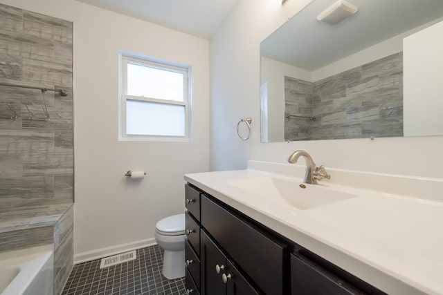 bathroom featuring tile patterned flooring, toilet, vanity, visible vents, and baseboards