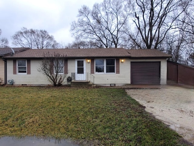 single story home with a garage and a front yard