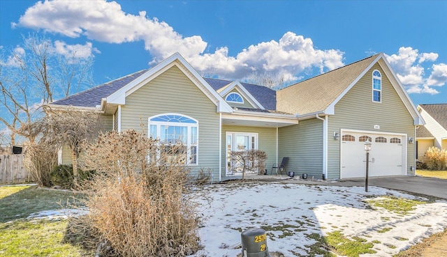 front of property with a garage