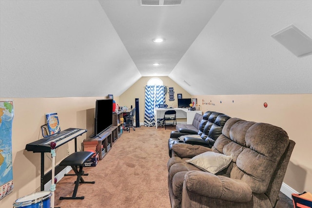 carpeted office space with vaulted ceiling