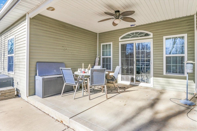 view of patio featuring ceiling fan