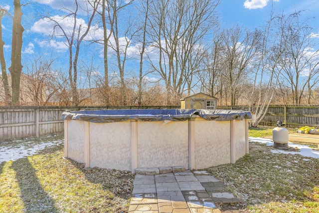 view of outbuilding with a covered pool