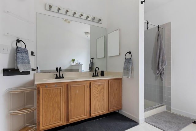 bathroom with vanity and walk in shower