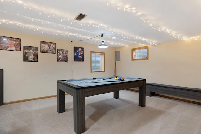 recreation room featuring electric panel and light carpet