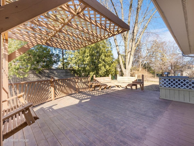 wooden deck with a pergola