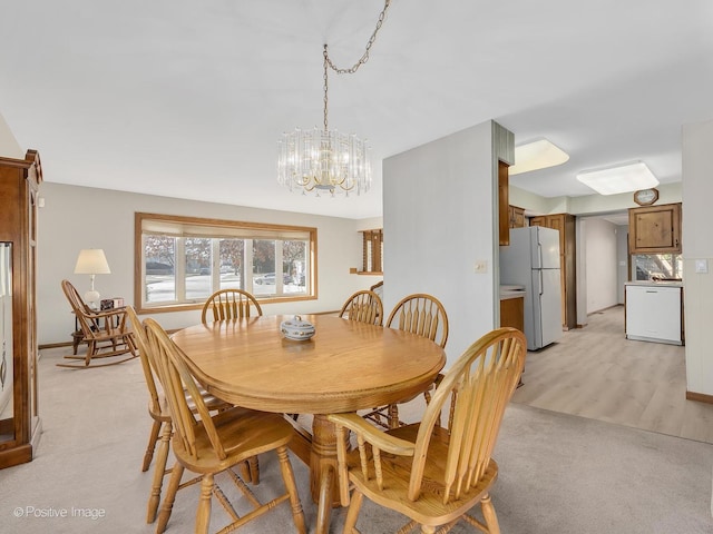 view of carpeted dining space