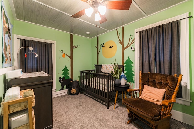 bedroom with ceiling fan and carpet floors