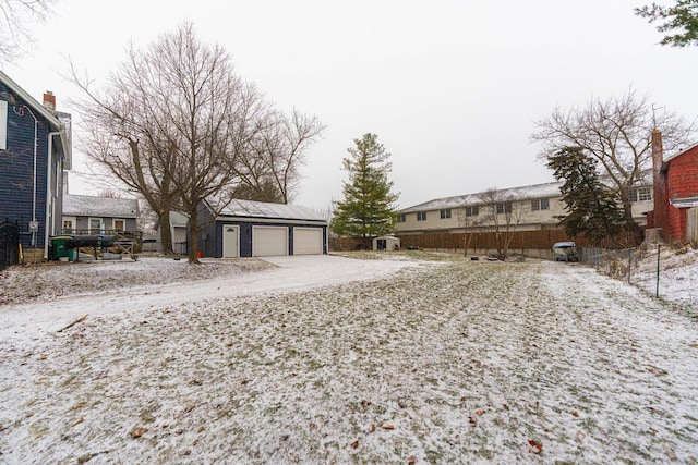 view of yard with a garage