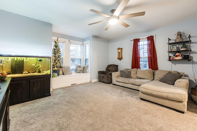 living room with carpet and ceiling fan