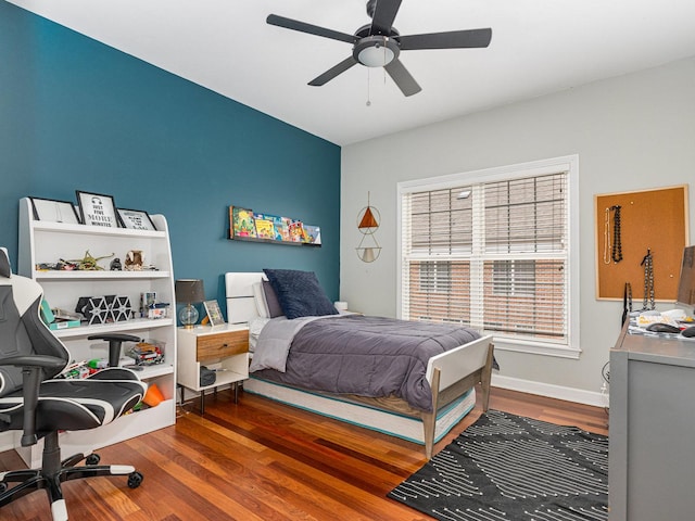 bedroom with hardwood / wood-style flooring and ceiling fan