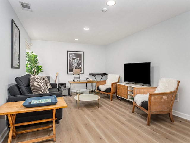 living room featuring light wood-type flooring