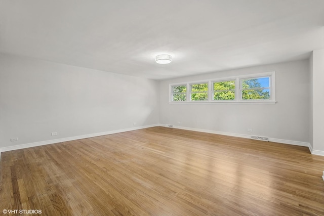 empty room featuring light hardwood / wood-style floors