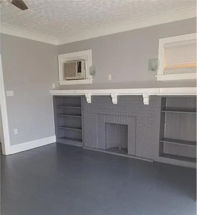 unfurnished living room with ornamental molding and a textured ceiling