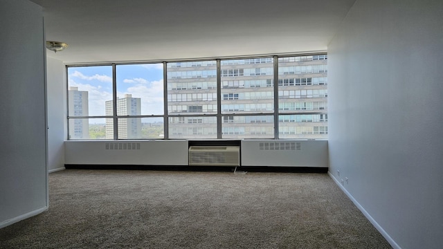 4800 S Chicago Beach Dr Unit 1404S, Chicago, IL 60615 - empty room with carpet flooring, baseboards, and a city view