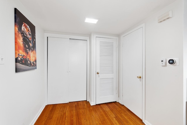 hall featuring light hardwood / wood-style flooring